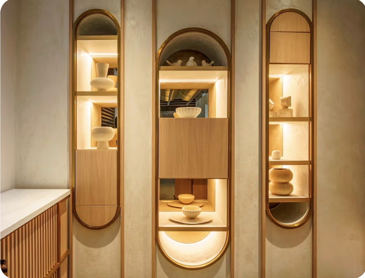 Arched display shelves with linear LED