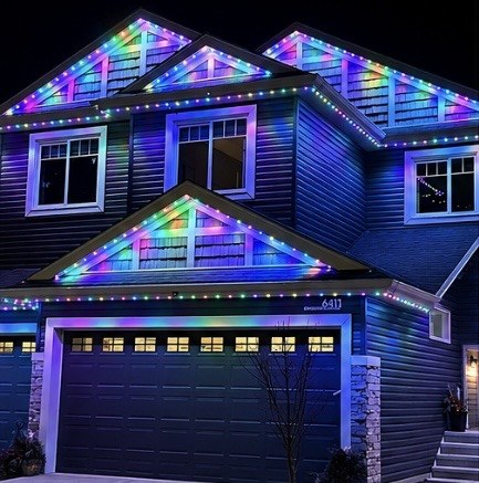 House gables with rainbow discrete puck lights